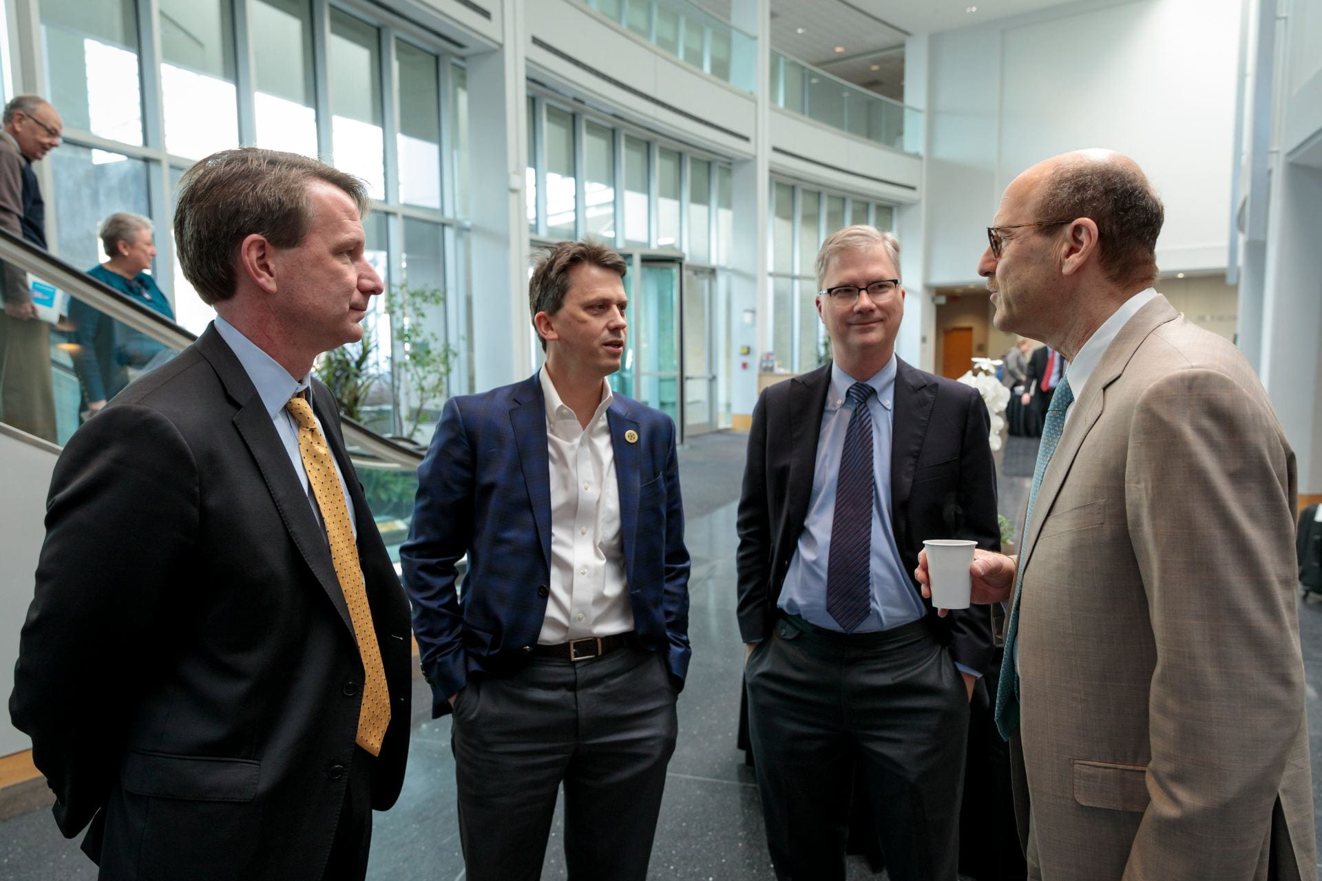 NCI Director Norman E. "Ned" Sharpless, MD, Clay Thorp, Provost Holden Thorp and Dean David Perlmutter